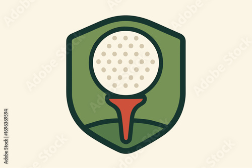 Golf ball on tee inside a green shield emblem for sports.