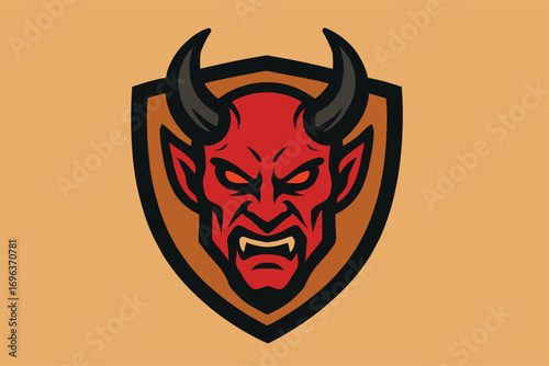Red Devil Head Mascot with Horns and Fangs on a Shield.