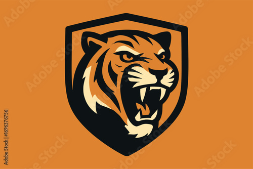 Fierce Tiger Head Mascot Emblem in Shield Shape.