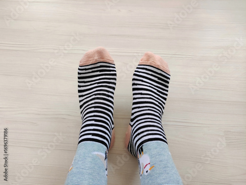Bright children's multi-colored socks with decorative pattern, top view	
