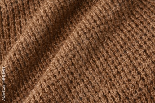 Warm beige and brown knitted sweater, perfect for cozy autumn and winter wear