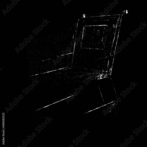 Black and white artistic representation of a simple wooden chair in a dimly lit space