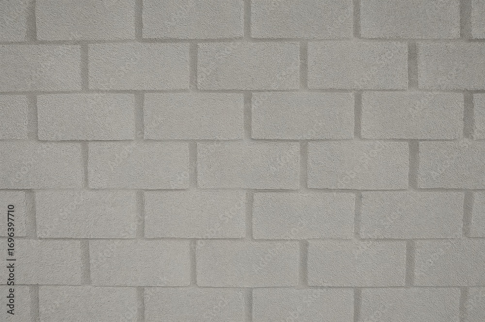 Naklejka premium Constructing a wall using foam blocks inside a residence