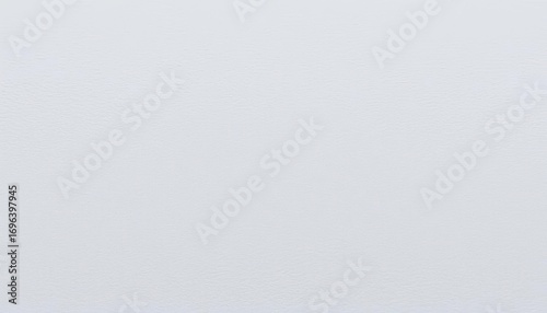 Close-up of textured paper, showing subtle fiber detail and soft shadows,  uneven,  sheet