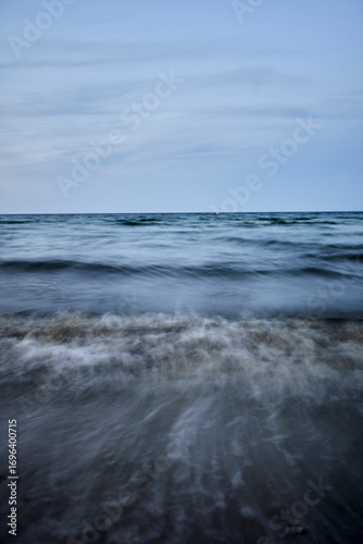 Waves of the baltic sea at the beach, long exposure