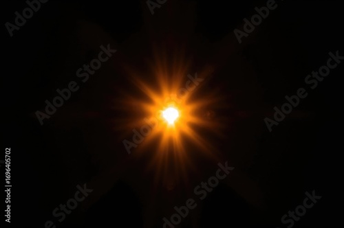 Glowing sunlight with radiant beams and golden rays against a dark backdrop