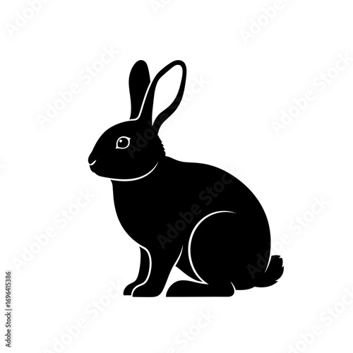 Charming black rabbit silhouette sitting peacefully, a symbol of nature, fertility, and gentle innocence, perfect for children's books, spring themes, or whimsical designs.