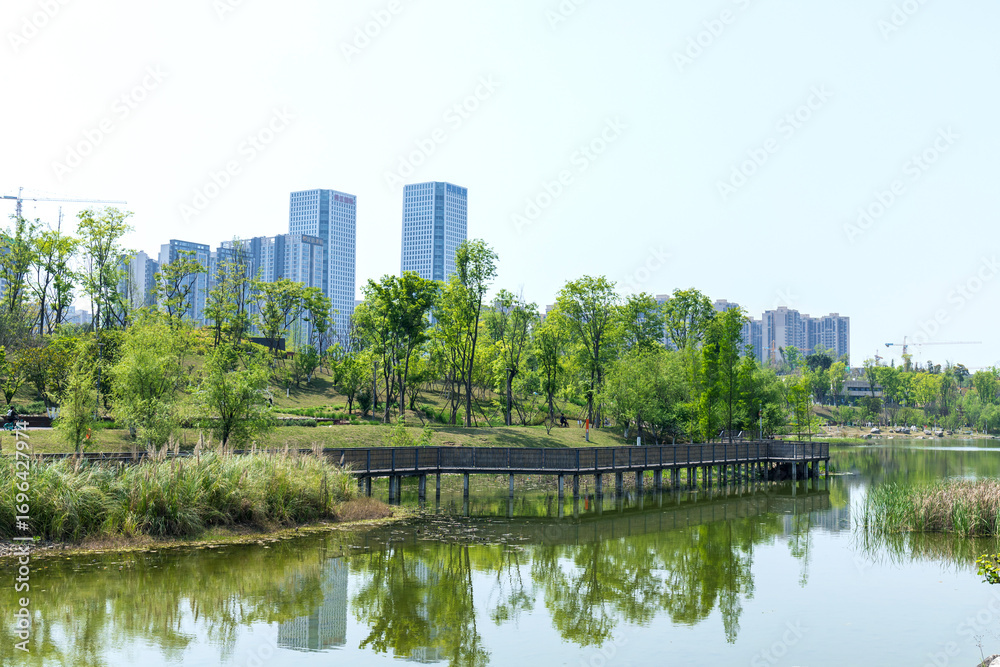 Naklejka premium The green scenery of the ecological lake in Chengdu Guixi Ecological Park