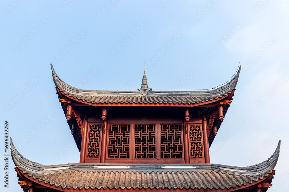 Fototapeta premium The red tiled roofs of traditional Chinese architecture