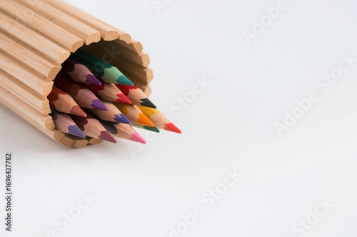 Colored pencils scattered o...