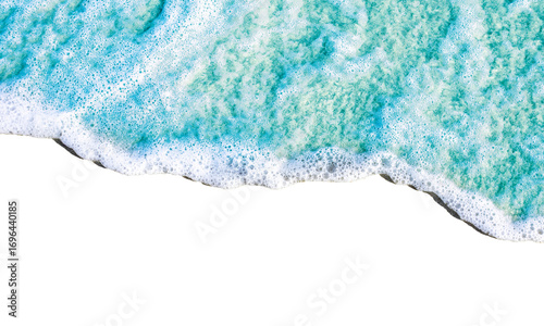 Aerial view of ocean waves with white foam on transparency background, creating dynamic and textured contrast