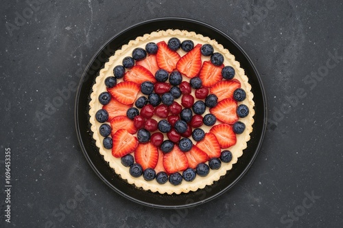Tasty fresh fruit tart topp...