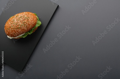 Tasty sandwich topped with ...