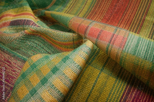 Vibrant Handwoven Fabric Featuring Stripes in Green, Yellow, and Pink