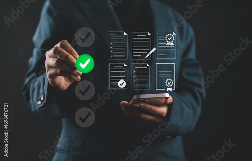 Businesswoman validating digital documents with green check mark symbol. Concept of certification, approval process and digital verification in business or compliance operations.