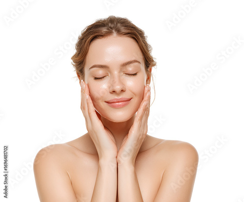 Radiant woman demonstrating skincare routine touching face enjoying self-care natural beauty with eyes closed beautiful complexion serene expression gentle touch peaceful calm