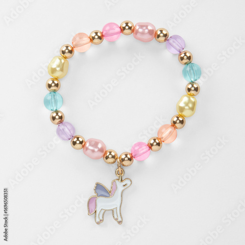 Charming pastel beaded bracelet adorned with a whimsical unicorn pendant