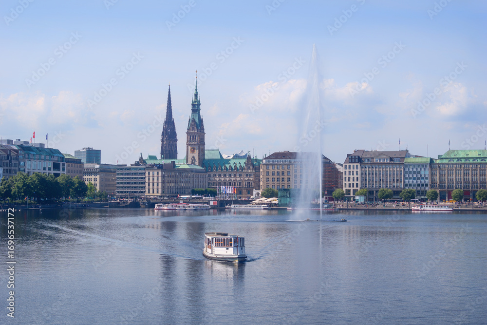 Fototapeta premium Hamburg, a beautiful boat trip on the Binnen-Alster with a view of the town hall and St. Nikolei