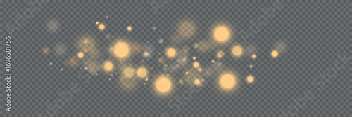 Magical golden cloud of glitter dust. Fine, shiny bokeh glitter particles and fine bright dust. Christmas golden glow effect on transparent PNG background.
