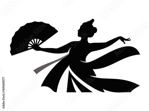 silhouette of a Balinese fan dancer in dramatic movement with dynamic flowing skirt