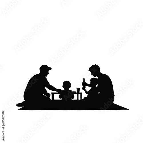 Family picnic silhouette with two adults and two children