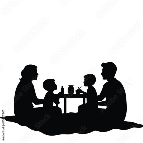 Family picnic silhouette with two children and parents at a table