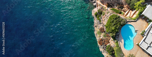 Panel kuchenny z motywem Aerial drone top view ultra wide photo of luxury tropical villa with large pool located in mediterranean destination