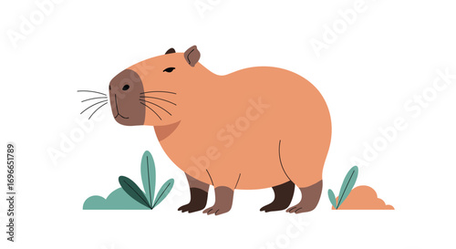 A cute capybara stands among green plants with its whiskers out