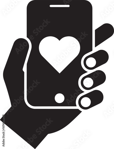 Mobile phone with heart icon held in hand symbolizing love and connection