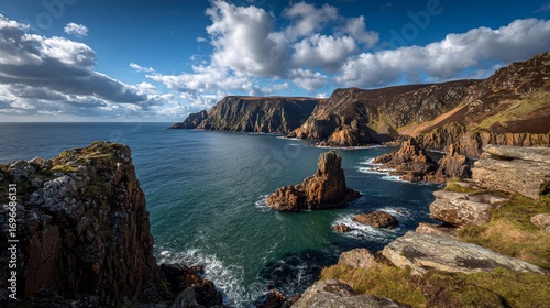 Rugged coastal vista with dramatic cliffs and sea stacks