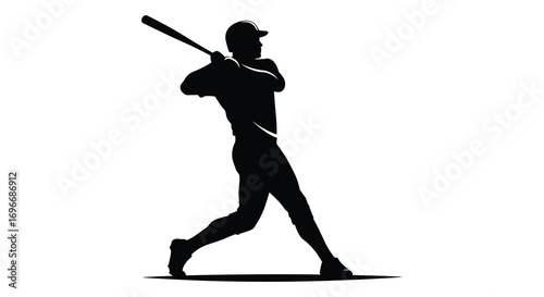 a baseball player swinging bat captured in silhouette
