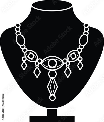 Elegant ornate necklace displayed on a black jewelry bust for presentation.