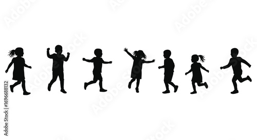 children playing together in park scene captured as silhouette