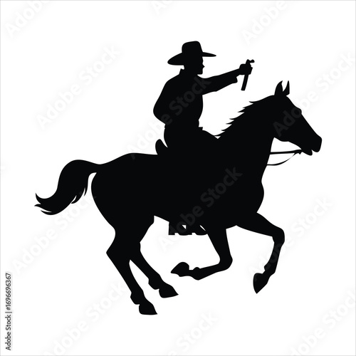 Silhouette of a cowboy on a galloping horse holding a lasso