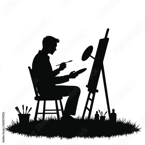 Silhouette of male artist painting outdoors with bottles Keywords: artist, painting, easel
