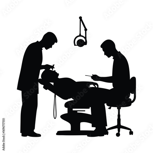 Two dentists and patient in dental chair silhouette