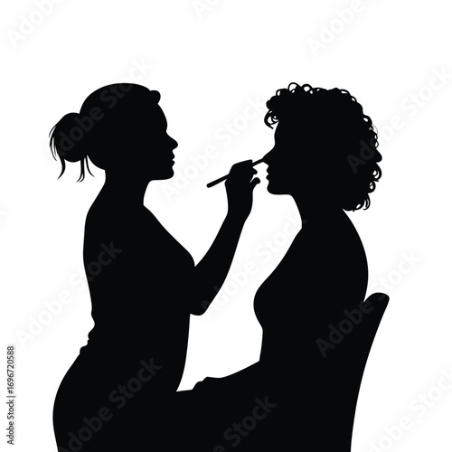 Woman applying makeup to woman silhouette vector (78