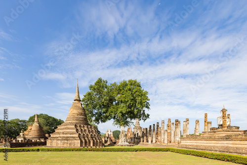 Ancient Buddha statue and ruin of temple of Wat mahathat temple in Sukhothai Historical Park, which also one of UNESCO Heritage Site