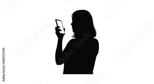 woman holding smartphone in hand side view silhouette