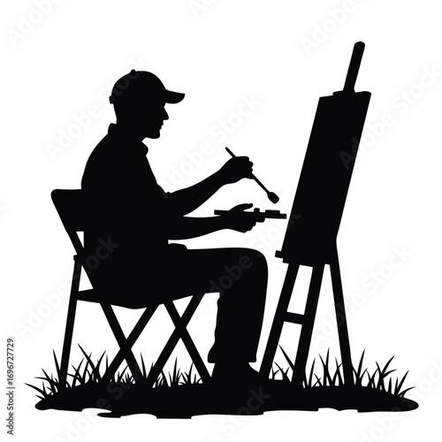 Seated artist silhouette painting with a brush and palette outdoors