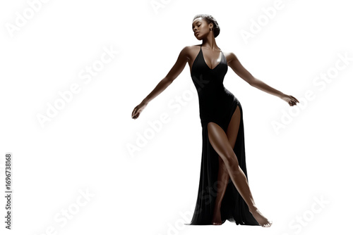 Elegant dancer in flowing black gown captures attention with dramatic movement and poise