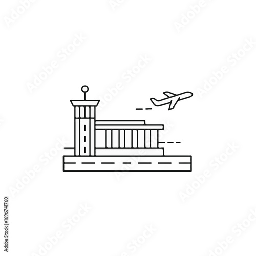 Airport terminal with control tower and airplane flying overhead  