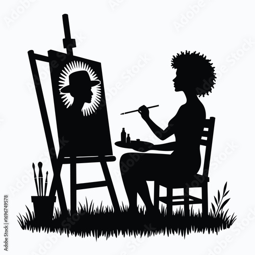Silhouette of a woman painting a portrait on an easel Keywords: silhouette, woman, painting
