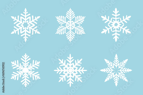 White snowflakes on a blue background. Vector illustration
