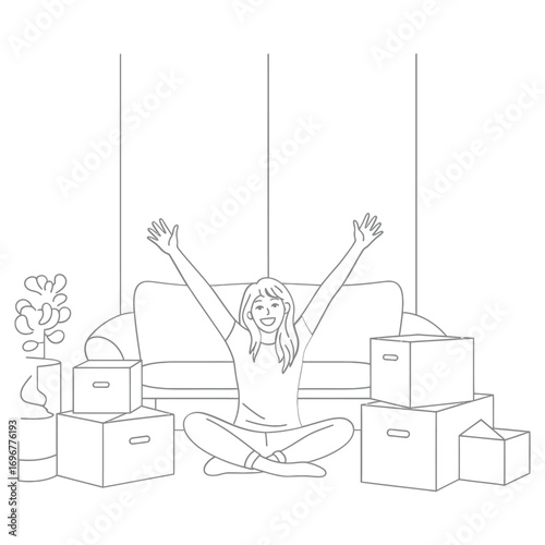 Woman celebrating with arms raised amidst moving boxes and furniture