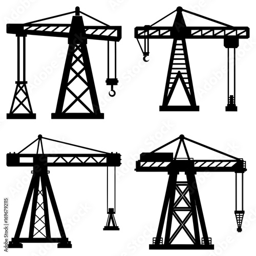 Silhouette illustration of four construction cranes in various styles and orientations on a white background