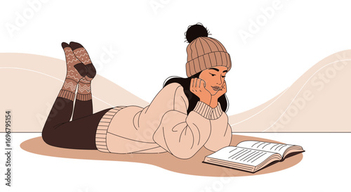 Relaxed Young Woman in Winter Clothing Enjoying a Book, Comfort And Leisure