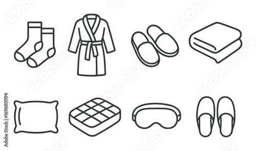 Set of sleep accessories including robe, slippers, socks, blanket, pillow, eye mask