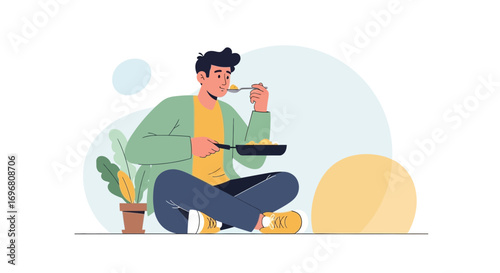 Young Man Enjoying Meal While Sitting, Demonstrating Healthy Eating Habits And Lifestyle