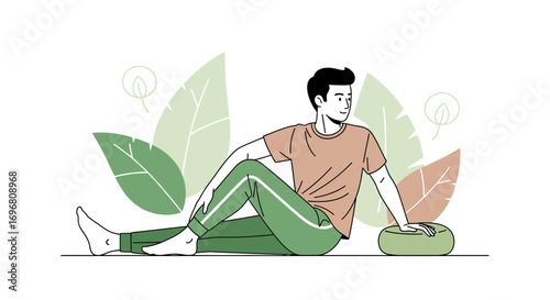 Young Man Practicing Yoga On Floor Surrounded By Natural Leafy Decorations